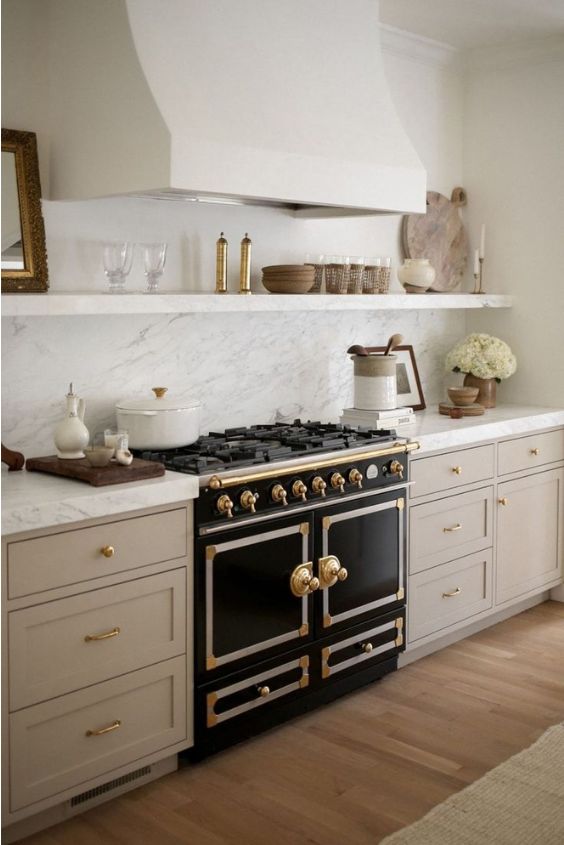 Taupe Cabinets with a Statement Range Hood